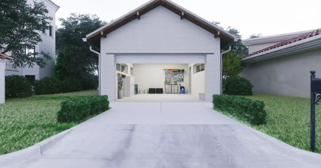 Open Garage With Concrete Driveway